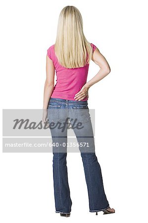 Rear View Of Women In Jeans Photos and Premium High Res Pictures