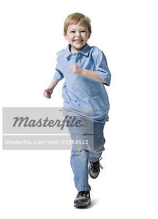 Boy running and smiling