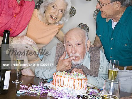 Portrait of a group of senior people celebrating a birthday