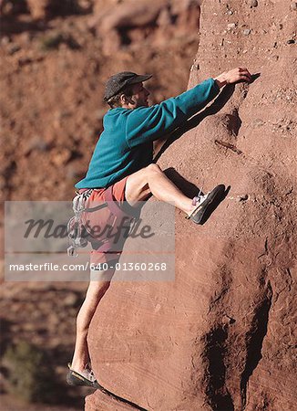 Man rock climbing