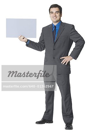 Businessman holding a blank sign