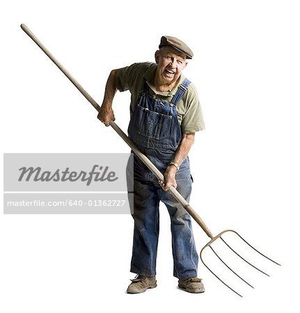 640-01362727em-farmer-holding-a-pitchfork-stock-photo.jpg