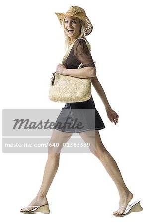 Profile Of A Woman Carrying A Hand Bag, Chicago, Cook County, Illinois, USA  Stock Photo, Picture and Royalty Free Image. Image 23232710.