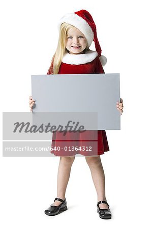 Portrait of a girl holding a blank sign