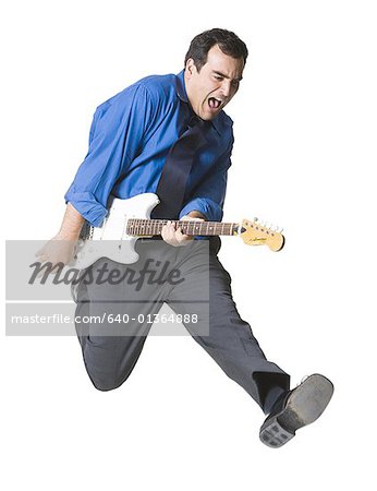 Businessman playing a guitar