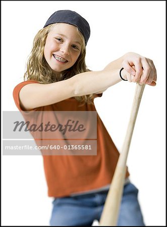 Portrait of a girl holding a baseball bat