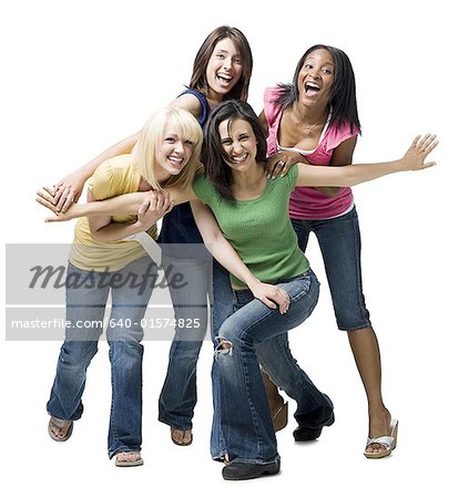 Four women laughing and playing