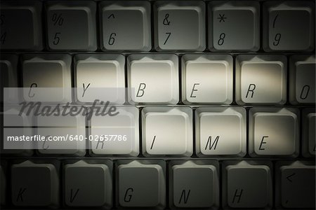 keyboard with "cyber crime" highlighted