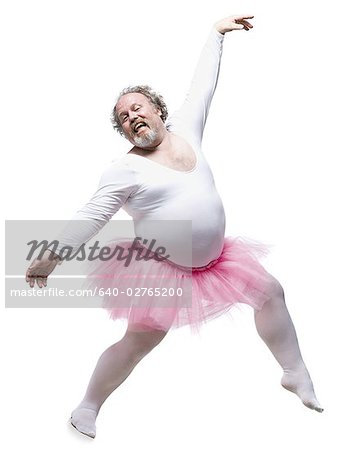 Overweight man in ballerina tutu smiling and dancing