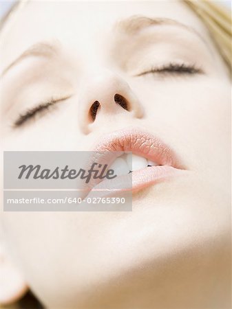 Closeup of woman with eyes closed