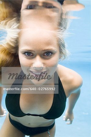 Portrait of a teenage girl swimming underwater, Stock Photo, Picture And  Royalty Free Image. Pic. WR0906977