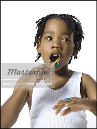 Boy brushing his teeth