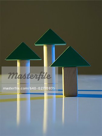 Green triangles on wooden blocks