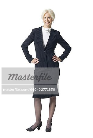 Mature businesswoman standing and smiling