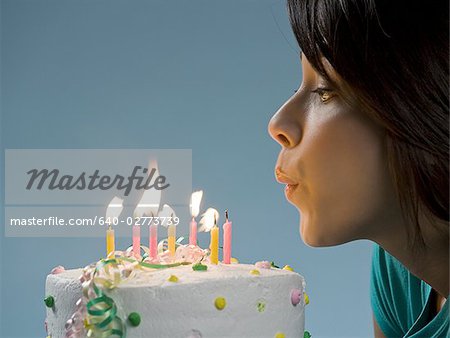 Girl Blows Birthday Cake Candles - Stock Video | Motion Array