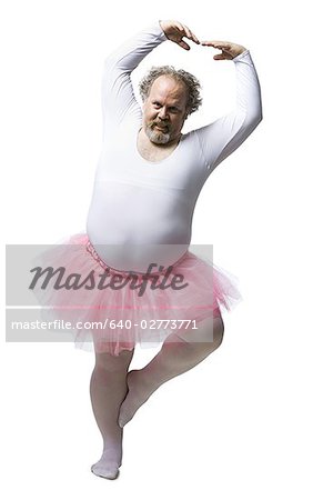 Obese man in tutu dancing and smiling