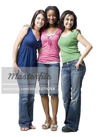 Three women hugging and smiling