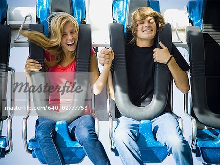 young couple at an amusement park