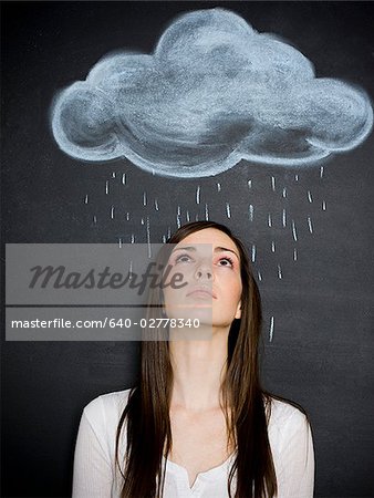 young woman against a chalkboard