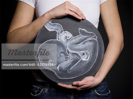 Woman with a drawing of a baby