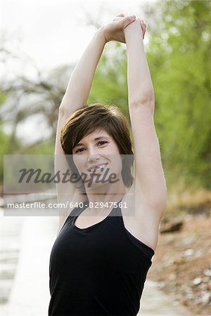 woman stretching before a workout