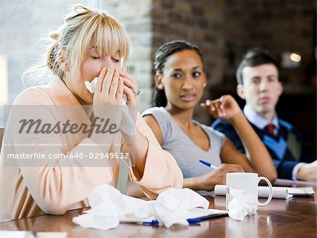 woman sick at work