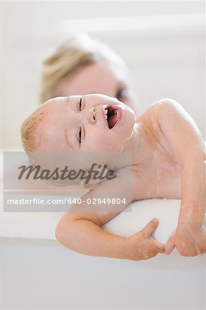 mother and baby taking a bubble bath