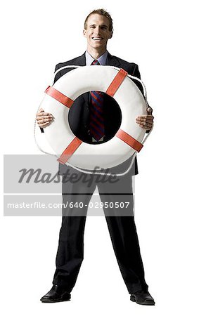 businessman holding a life preserver