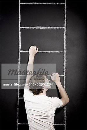 man climbing a ladder