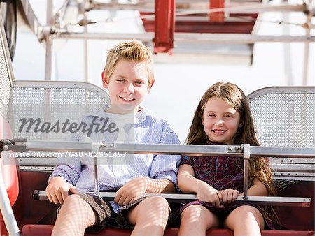 boy and girl on a ferris wheel