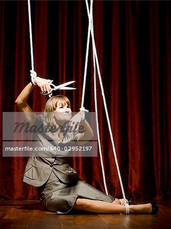female puppet on a string