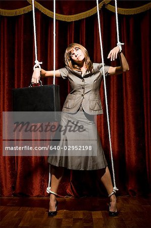 female puppet on a string