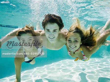 teenagers in a swimming pool - Stock Photo - Masterfile - Premium  Royalty-Free, Code: 640-02952470