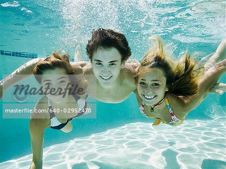 teenagers in a swimming pool