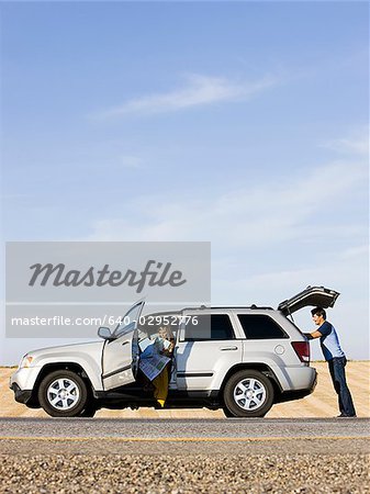 couple pulled over on the side of the road