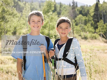 brother and sister hiking