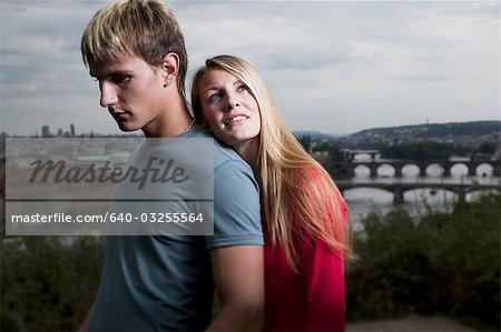 Affectionate couple with scenic background