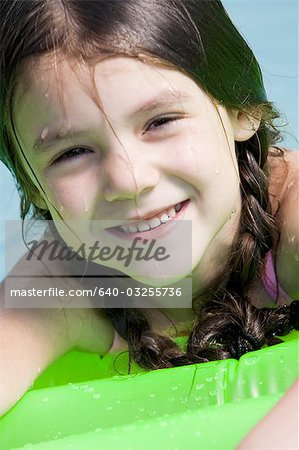 Girl on floatation device