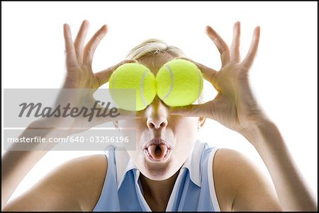 Woman with tennis ball eyes