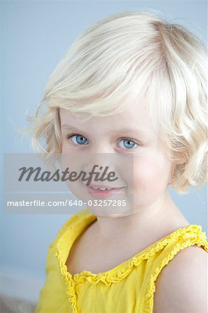 Girl (2-3) wearing yellow shirt, portrait