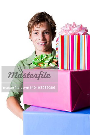 Boy carrying presents