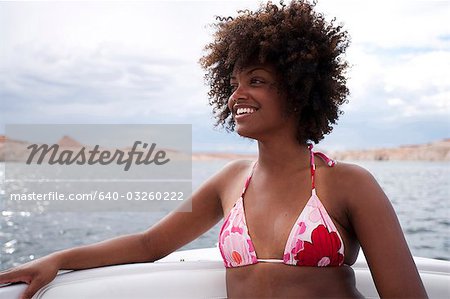 Woman in bikini on boat