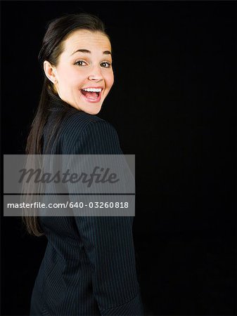 Closeup of woman in city at night