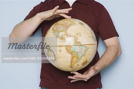 Man holding globe