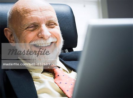 Closeup of businessman laughing