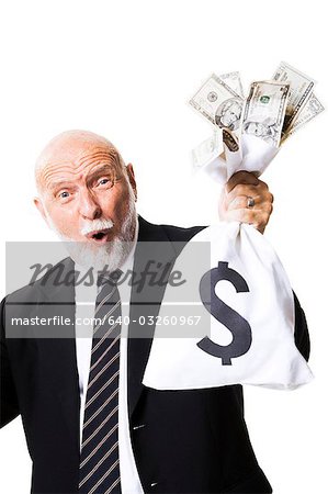 Business man holding money bag with dollar sign Photograph by Jorgo  Photography - Fine Art America