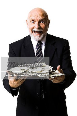 Business man holding money bag with dollar sign Photograph by Jorgo  Photography - Fine Art America