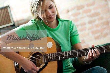 Woman holding guitar