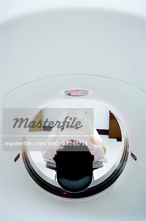 Patient entering MRI machine from behind