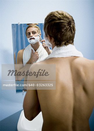 Male grooming himself